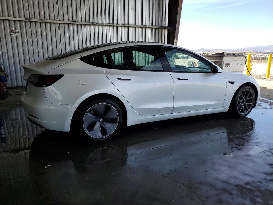 Photo 3 from auction – 2022 TESLA MODEL 3 with VIN 5YJ3E1EA5NF290914