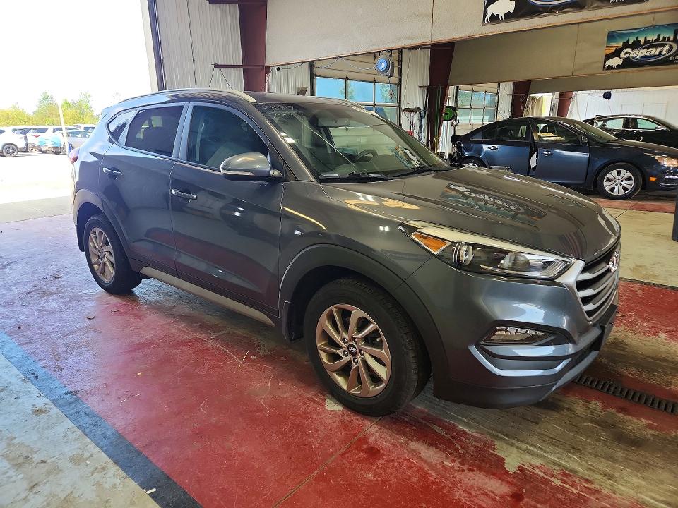 Photo 4 from auction – 2018 HYUNDAI TUCSON with VIN KM8J33A44JU800563