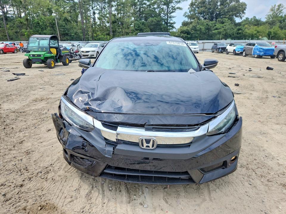 Photo 5 from auction – 2016 HONDA CIVIC with VIN 19XFC1F90GE036656
