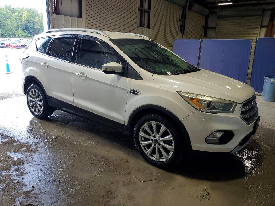 Photo 4 from auction – 2017 FORD ESCAPE with VIN 1FMCU0J95HUD06934