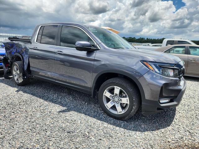 Photo 4 from auction – 2024 HONDA RIDGELINE with VIN 5FPYK3F50RB012771