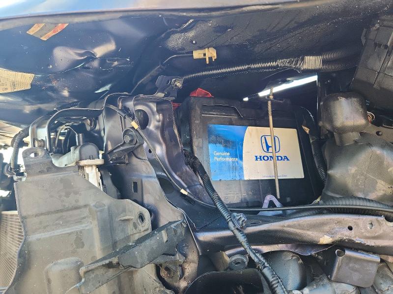 Photo 12 from auction – 2012 HONDA CR-V with VIN JHLRM3H77CC009296