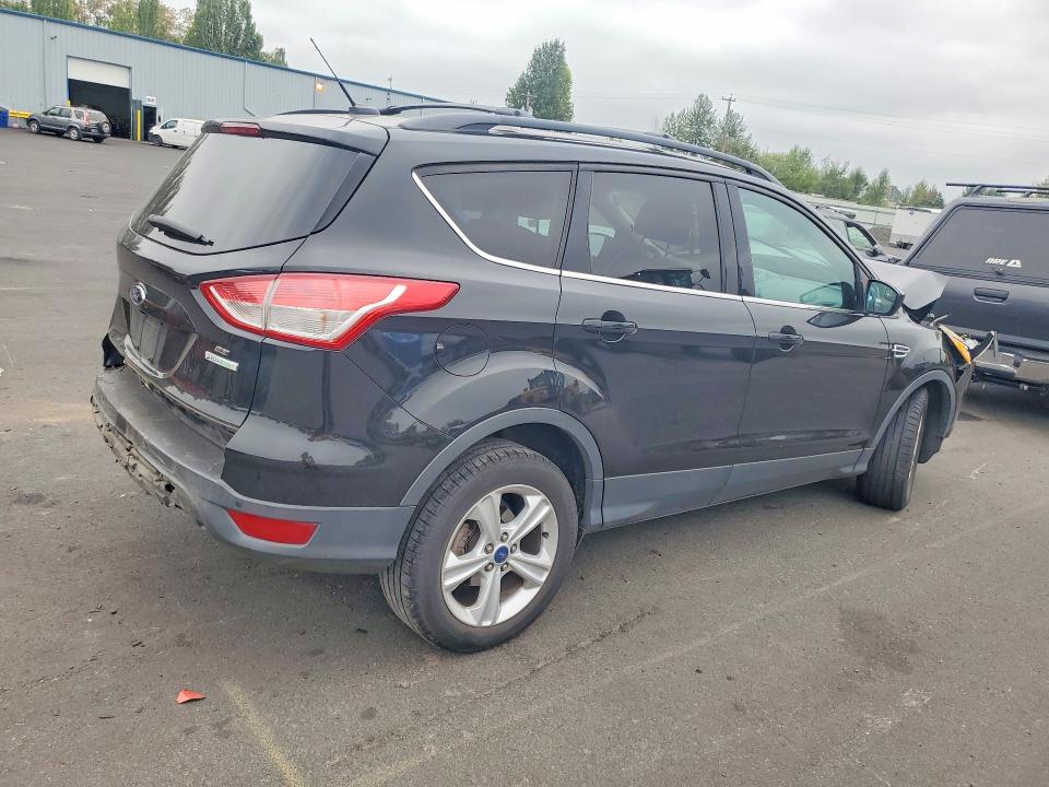 Photo 3 from auction – 2015 FORD ESCAPE with VIN 1FMCU0GX4FUB07182