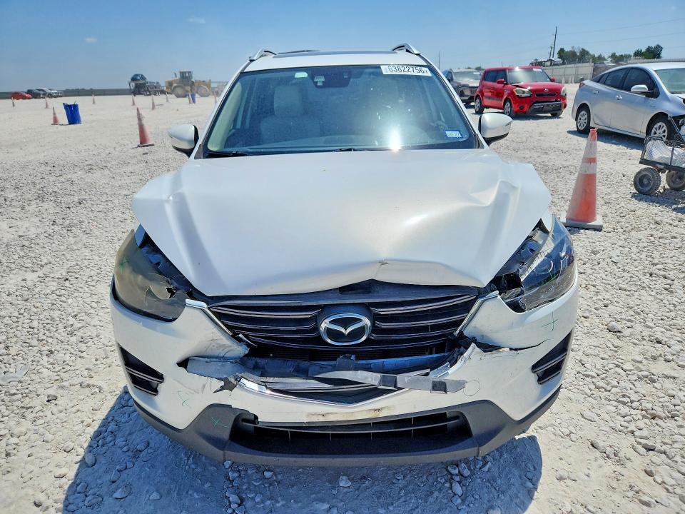 Photo 5 from auction – 2016 MAZDA CX-5 with VIN JM3KE2DY7G0635451