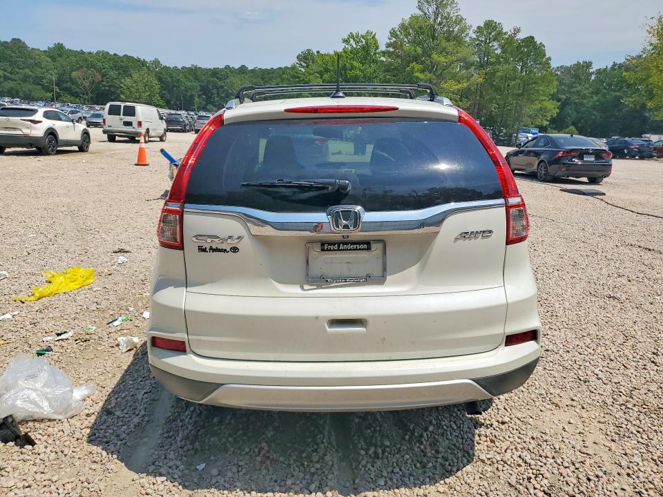 Photo 6 from auction – 2015 HONDA CR-V with VIN 5J6RM4H79FL035528