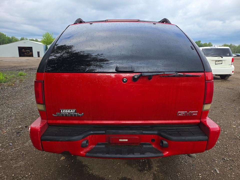 Photo 6 from auction – 2005 GMC JIMMY with VIN 1GKCT18X65K112376