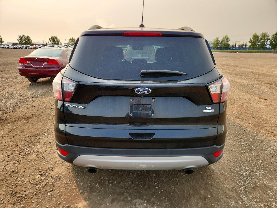 Photo 6 from auction – 2018 FORD ESCAPE with VIN 1FMCU9GD6JUC82665
