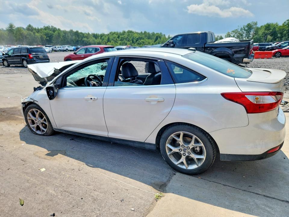Снимка 2 от търг – 2013 FORD FOCUS с VIN 1FADP3J26DL155161