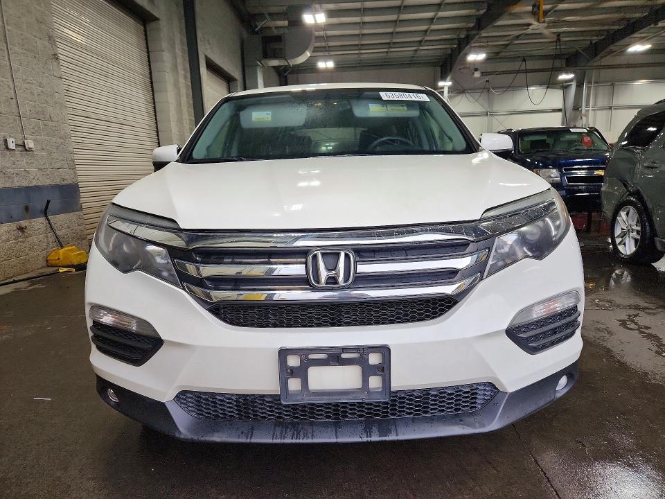 Photo 5 from auction – 2018 HONDA PILOT with VIN 5FNYF6H56JB001726