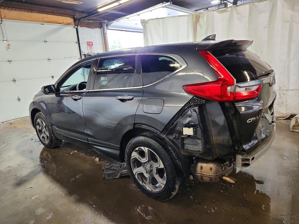 Photo 2 from auction – 2018 HONDA CR-V with VIN 7FARW2H51JE076478
