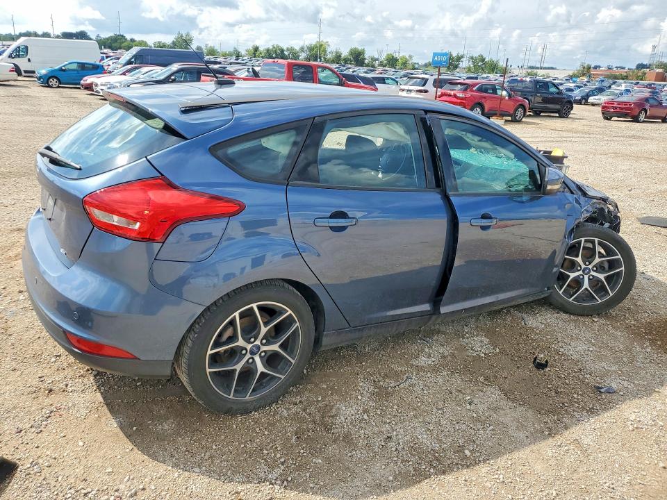 Photo 3 from auction – 2018 FORD FOCUS with VIN 1FADP3M26JL258104