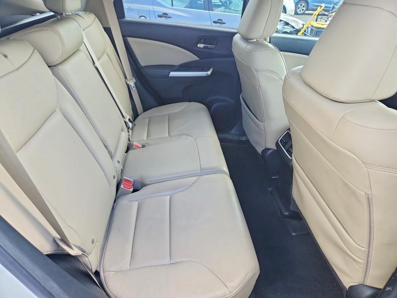 Photo 11 from auction – 2016 HONDA CR-V with VIN 5J6RM4H77GL049381