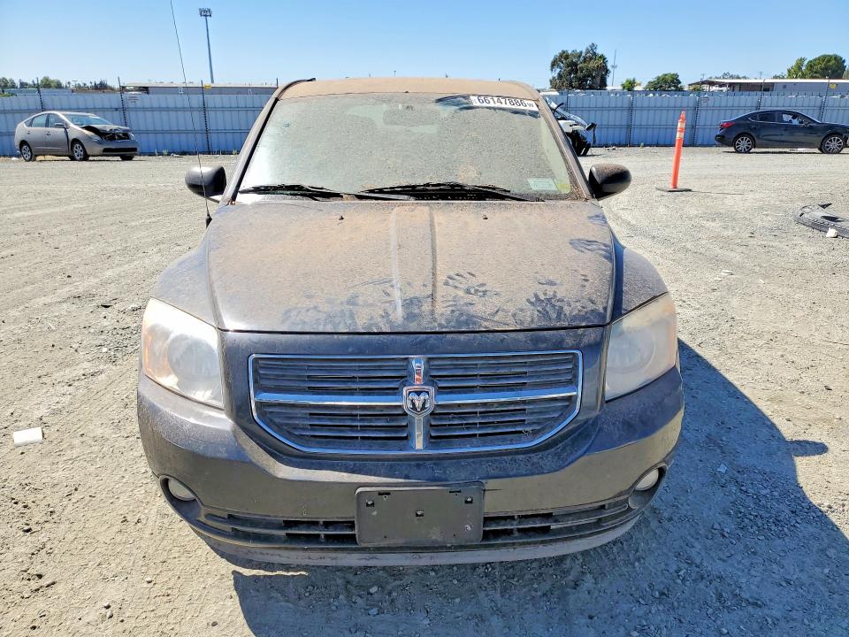 Photo 5 from auction – 2011 DODGE CALIBER with VIN 1B3CB3HA9BD120351