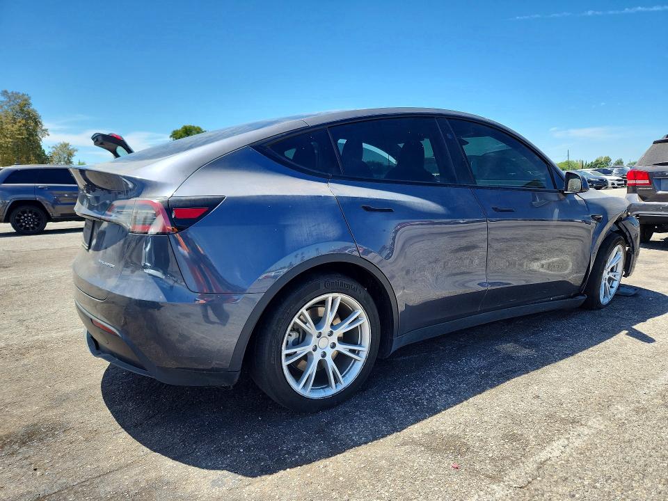 Photo 3 from auction – 2023 TESLA MODEL Y with VIN 7SAYGDEE1PF890369