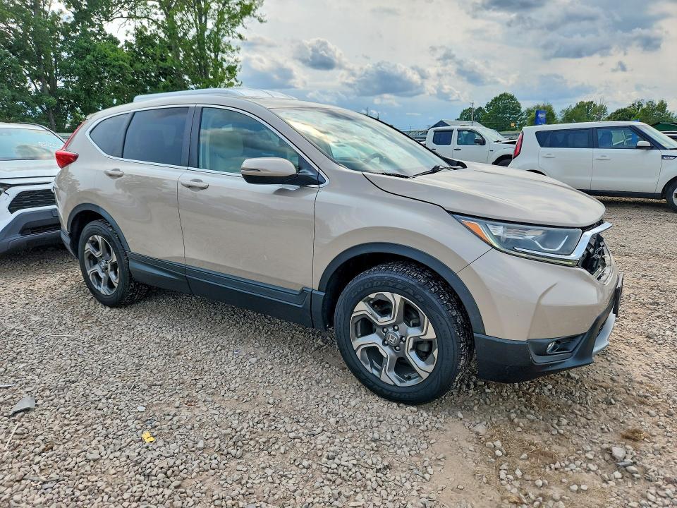 Photo 4 from auction – 2018 HONDA CR-V with VIN 5J6RW2H84JL004333