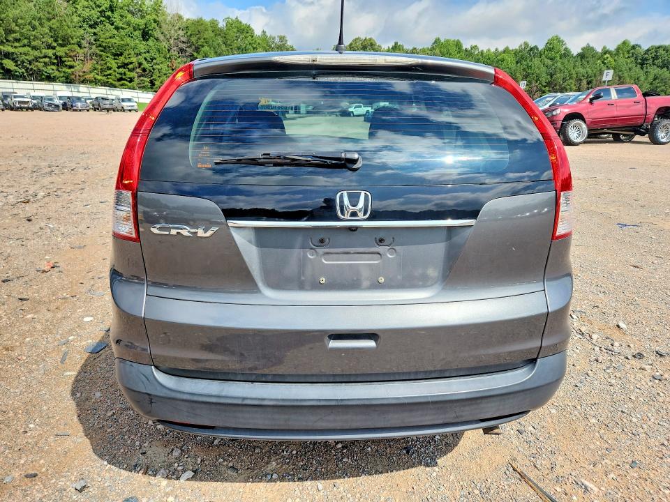 Photo 6 from auction – 2012 HONDA CR-V with VIN 3CZRM3H32CG700463