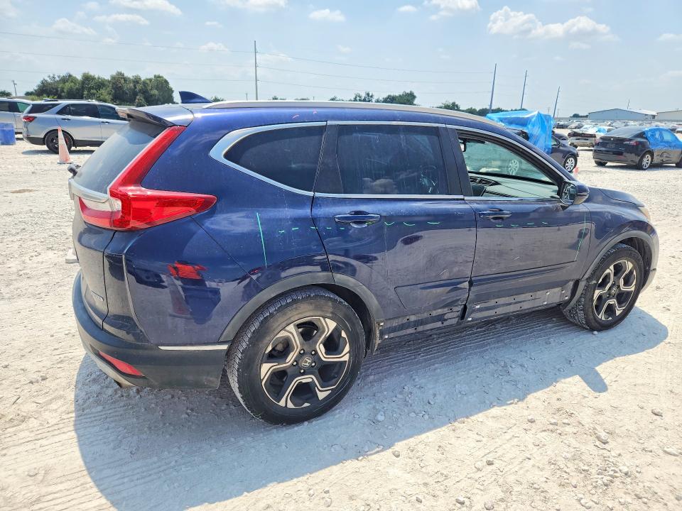 Photo 3 from auction – 2017 HONDA CR-V with VIN 7FARW1H99HE028427