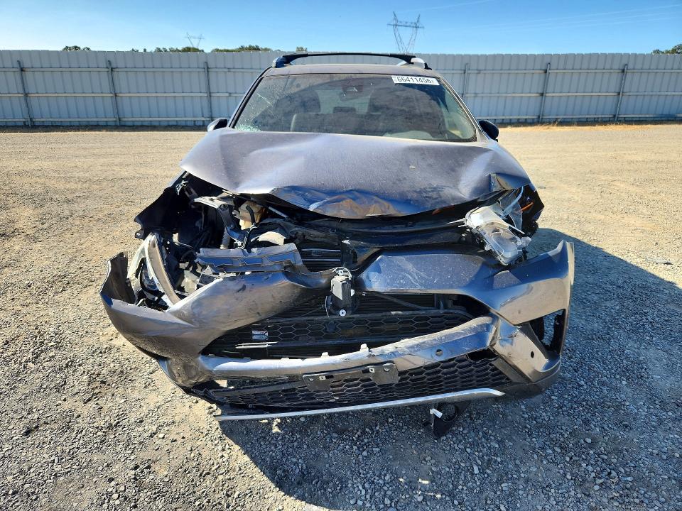 Photo 5 from auction – 2018 TOYOTA RAV4 HV with VIN JTMJJREV4JD163528