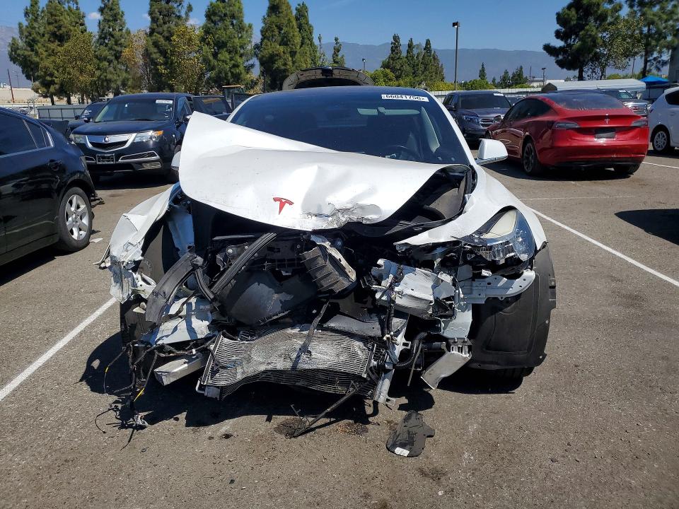 Photo 5 from auction – 2018 TESLA MODEL 3 with VIN 5YJ3E1EA2JF038726