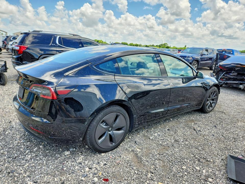 Photo 3 from auction – 2023 TESLA MODEL 3 with VIN 5YJ3E1EA4PF458903