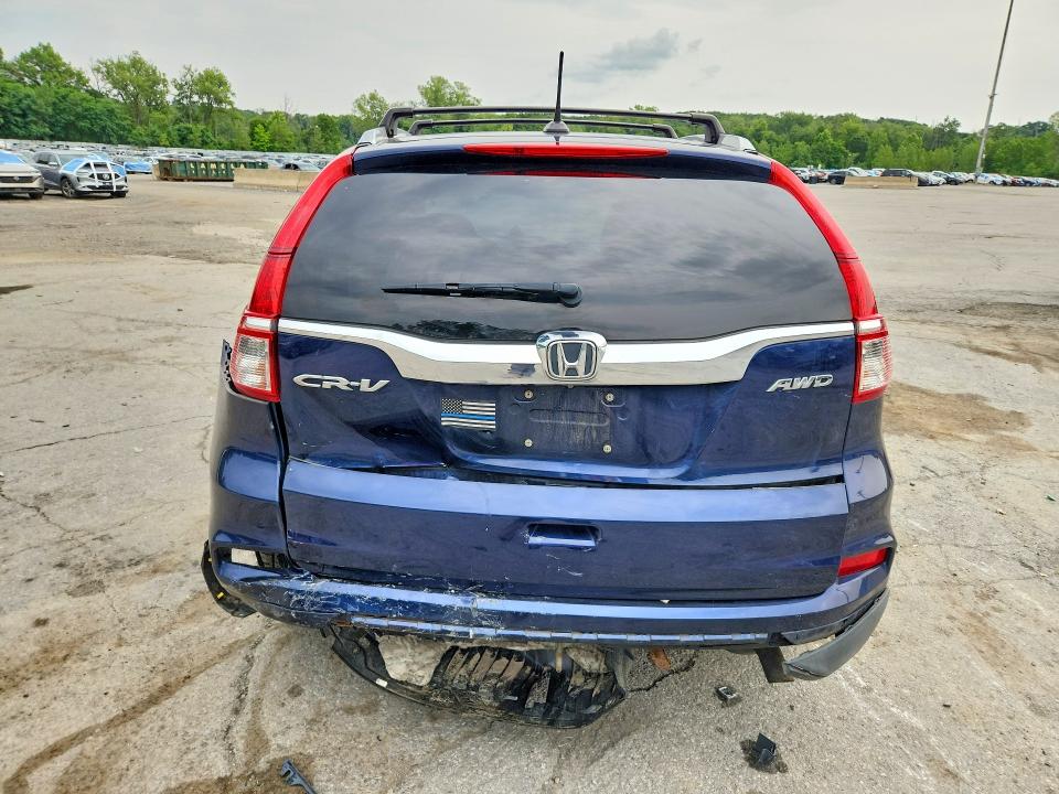 Photo 6 from auction – 2016 HONDA CR-V with VIN 2HKRM4H73GH705375