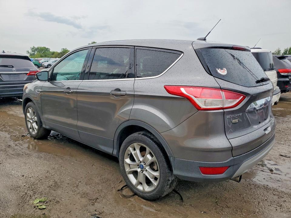Photo 2 from auction – 2013 FORD ESCAPE with VIN 1FMCU9H97DUC95052