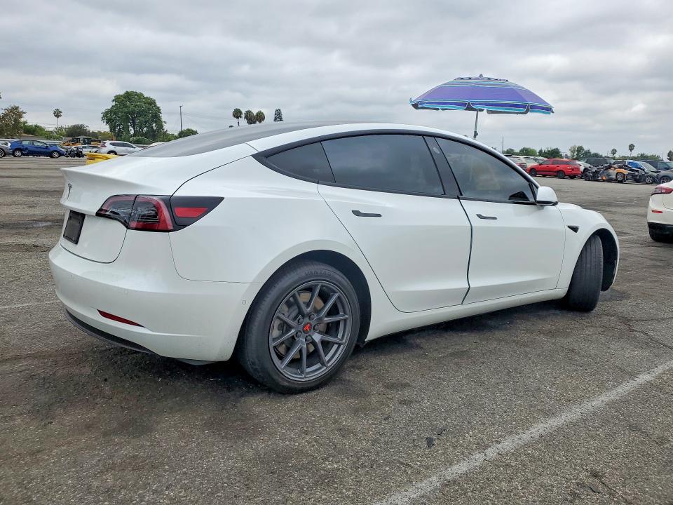 Photo 3 from auction – 2021 TESLA MODEL 3 with VIN 5YJ3E1EA2MF002782