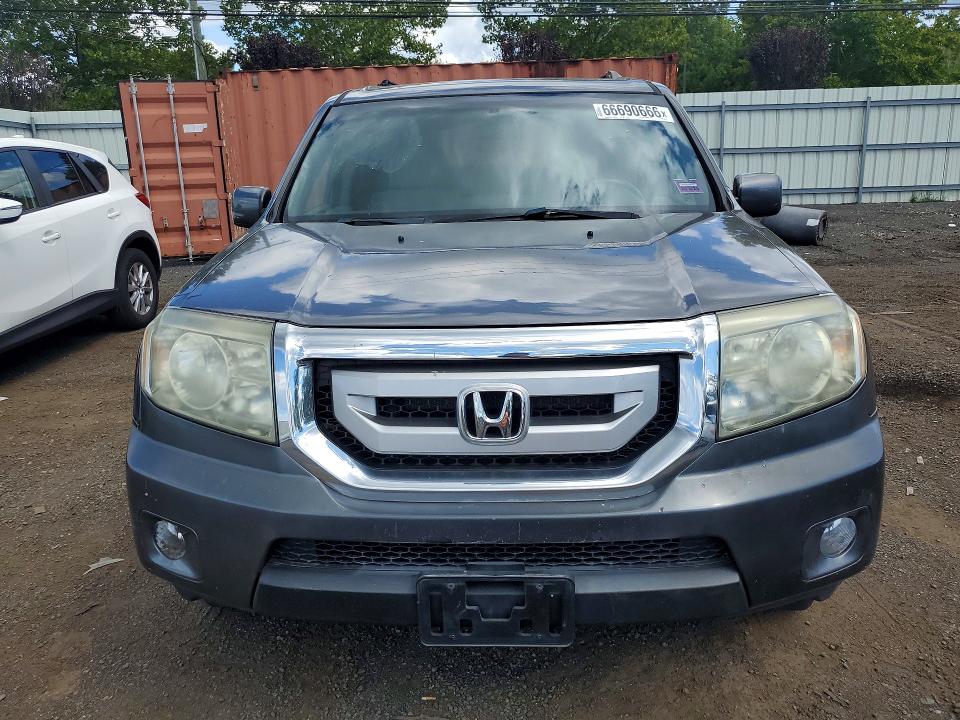 Photo 5 from auction – 2011 HONDA PILOT with VIN 5FNYF4H49BB045975