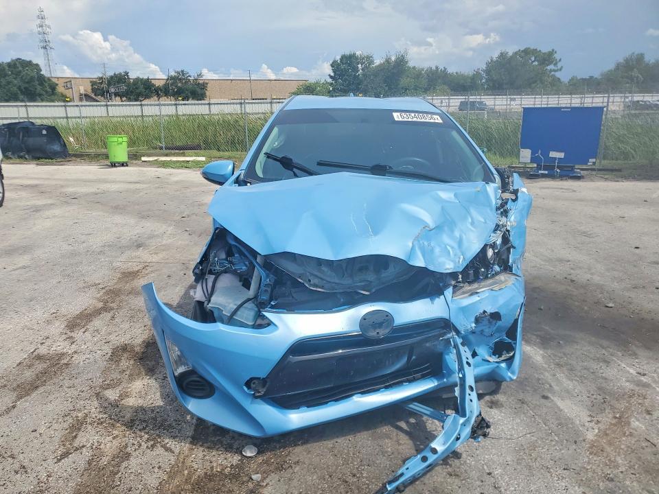 Photo 5 from auction – 2015 TOYOTA PRIUS C with VIN JTDKDTB31F1110709