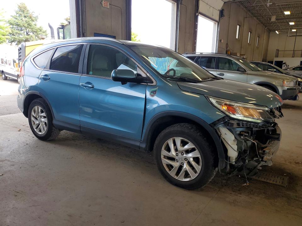 Photo 4 from auction – 2015 HONDA CR-V with VIN 5J6RM4H76FL009405