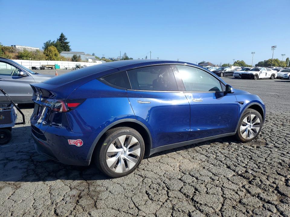 Photo 3 from auction – 2023 TESLA MODEL Y with VIN 7SAYGDEE2PF949459