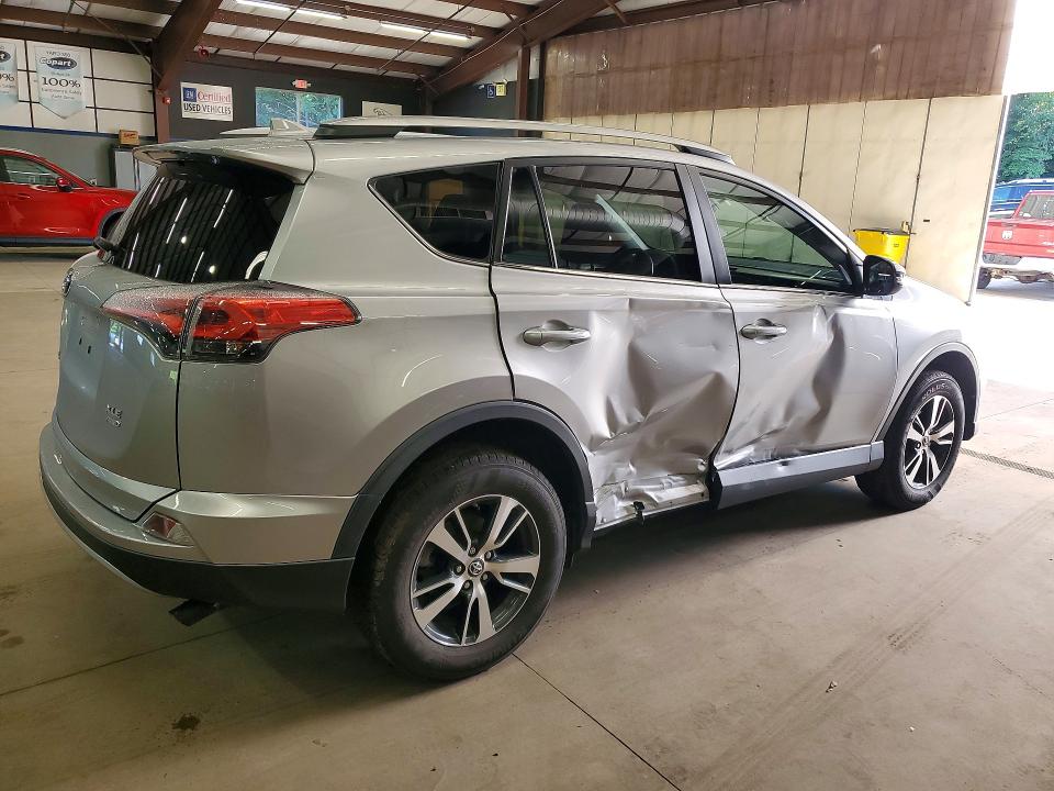 Photo 3 from auction – 2018 TOYOTA RAV4 with VIN 2T3RFREV3JW796397