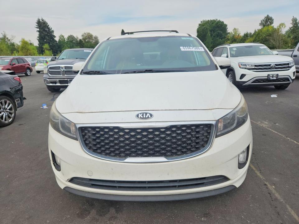 Photo 5 from auction – 2015 KIA SEDONA with VIN KNDMC5C19F6045146
