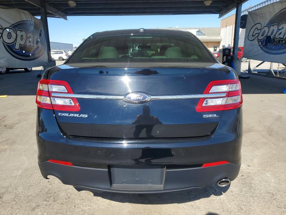 Photo 6 from auction – 2017 FORD TAURUS with VIN 1FAHP2E80HG105431