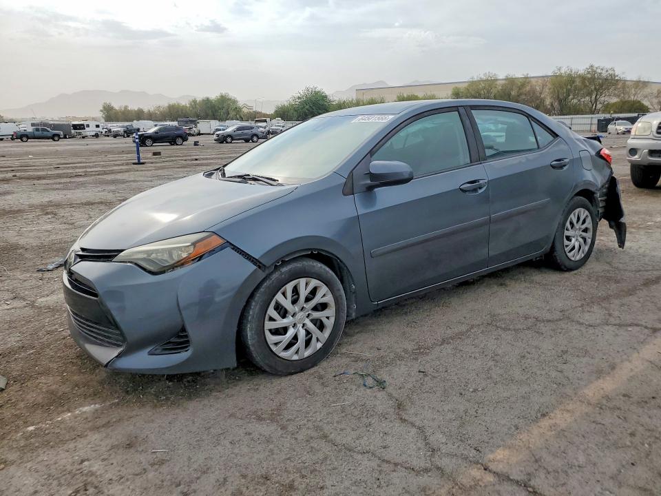 TOYOTA COROLLA 2017 con VIN 2T1BURHE5HC773601 - Foto de la subasta