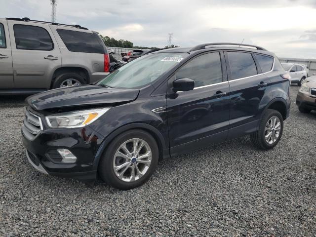 FORD ESCAPE 2018 with VIN 1FMCU0GD5JUA79617 - Photo from auction
