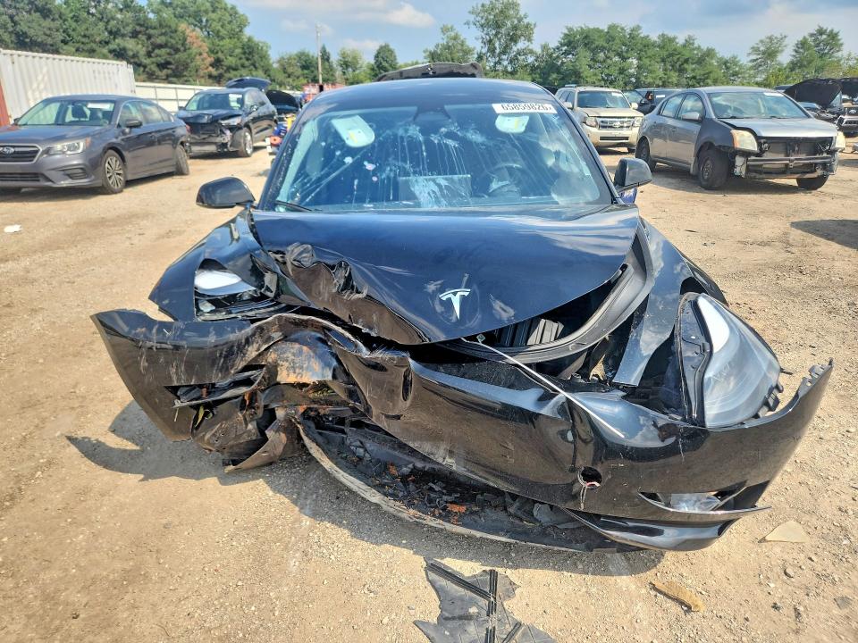 Photo 5 from auction – 2023 TESLA MODEL 3 with VIN 5YJ3E1EA1PF619711