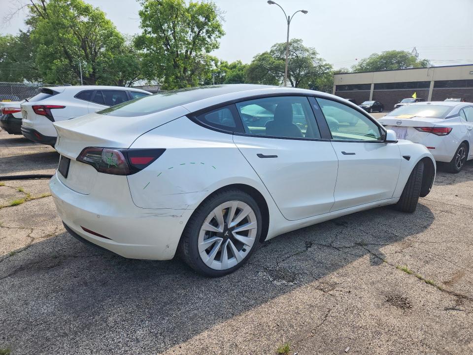 Photo 3 from auction – 2022 TESLA MODEL 3 with VIN 5YJ3E1EA4NF190531