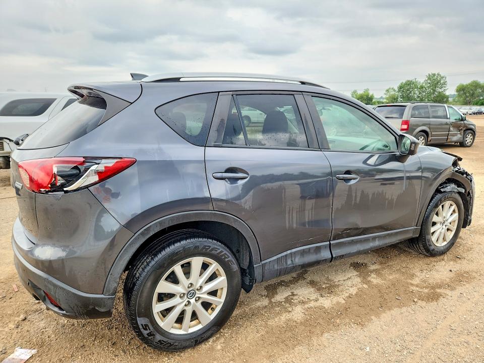 Photo 3 from auction – 2014 MAZDA CX-5 with VIN JM3KE4CY2E0384915