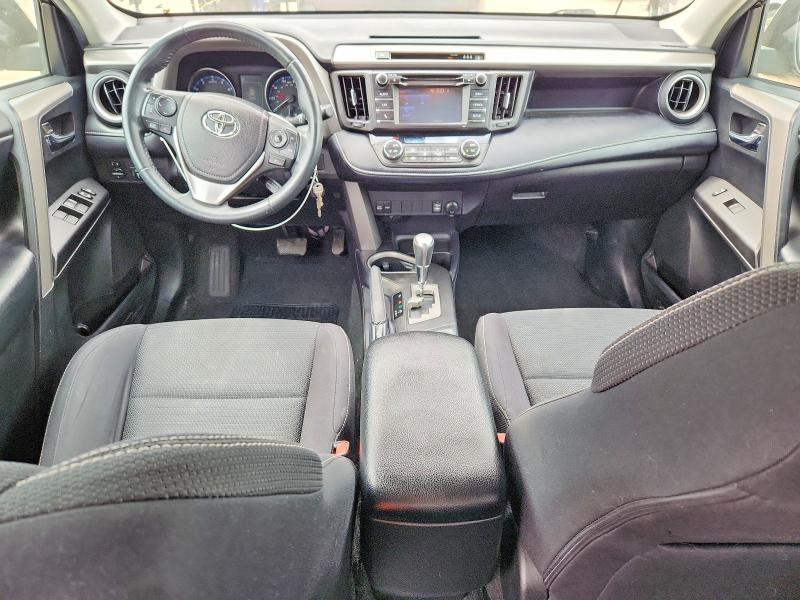 Photo 8 from auction – 2018 TOYOTA RAV4 with VIN 2T3WFREV8JW411242