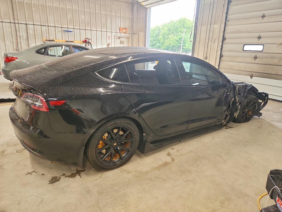 Photo 3 from auction – 2022 TESLA MODEL 3 with VIN 5YJ3E1EB1NF107596