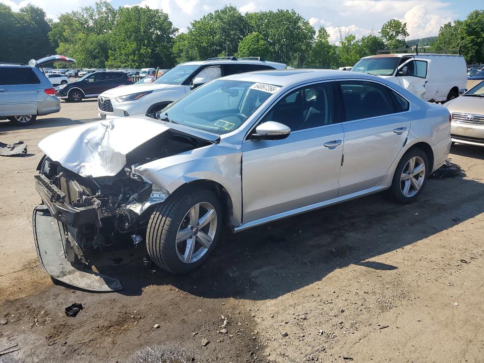 VOLKSWAGEN PASSAT 2012 with VIN 1VWBP7A38CC090018 - Photo from auction