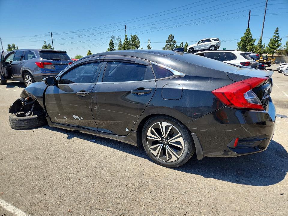 Photo 2 from auction – 2017 HONDA CIVIC with VIN 2HGFC1F34HH659507