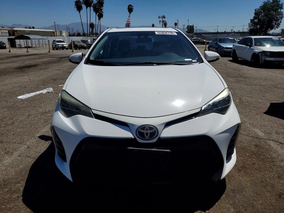Photo 5 from auction – 2017 TOYOTA COROLLA with VIN 5YFBURHE1HP672300