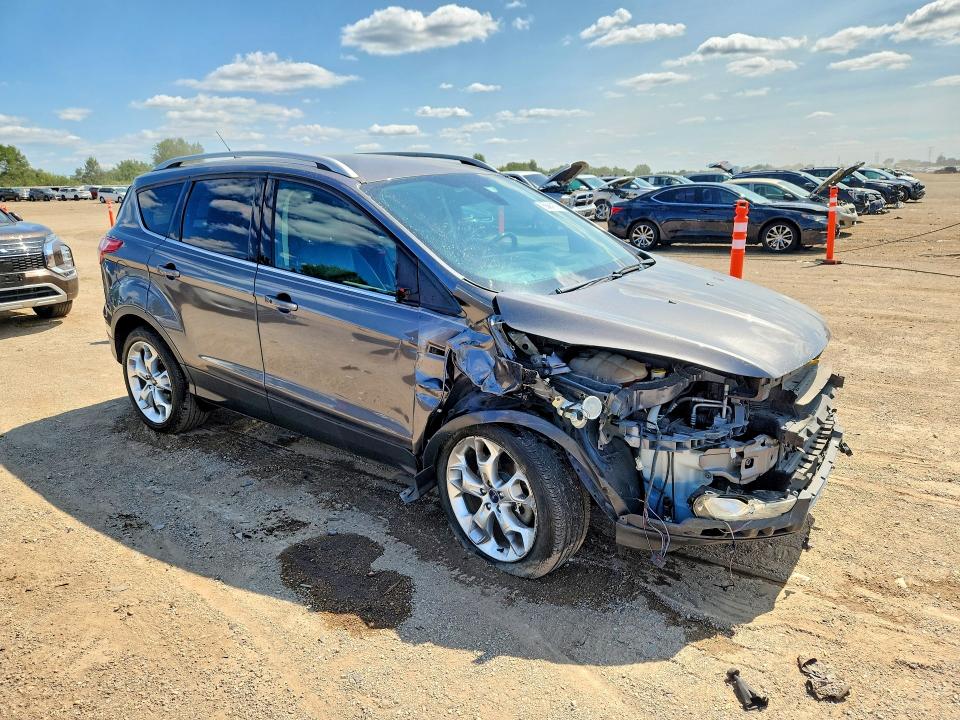 Photo 4 from auction – 2014 FORD ESCAPE with VIN 1FMCU0J91EUA27847