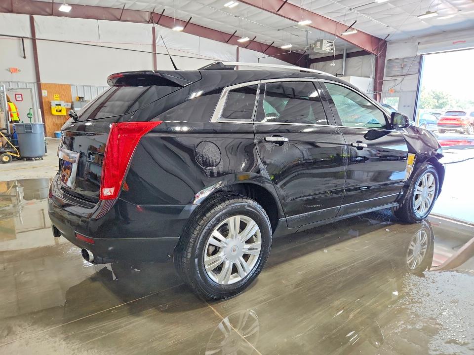 Photo 3 from auction – 2011 CADILLAC SRX with VIN 3GYFNAEY1BS668542