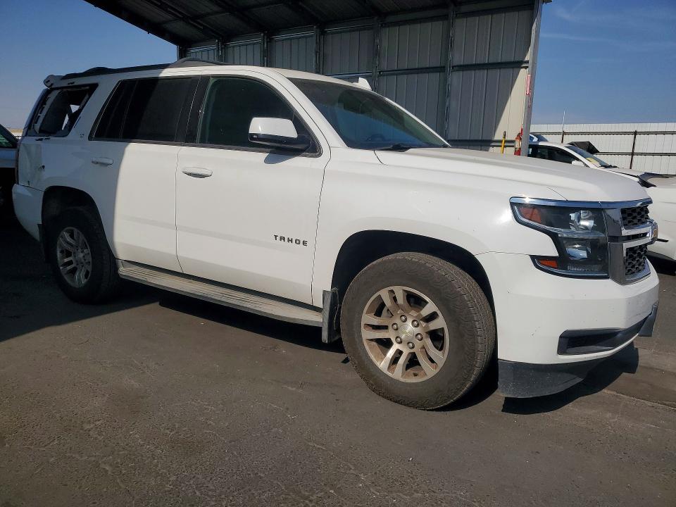 Photo 4 from auction – 2015 CHEVROLET TAHOE with VIN 1GNSKBKC0FR604861