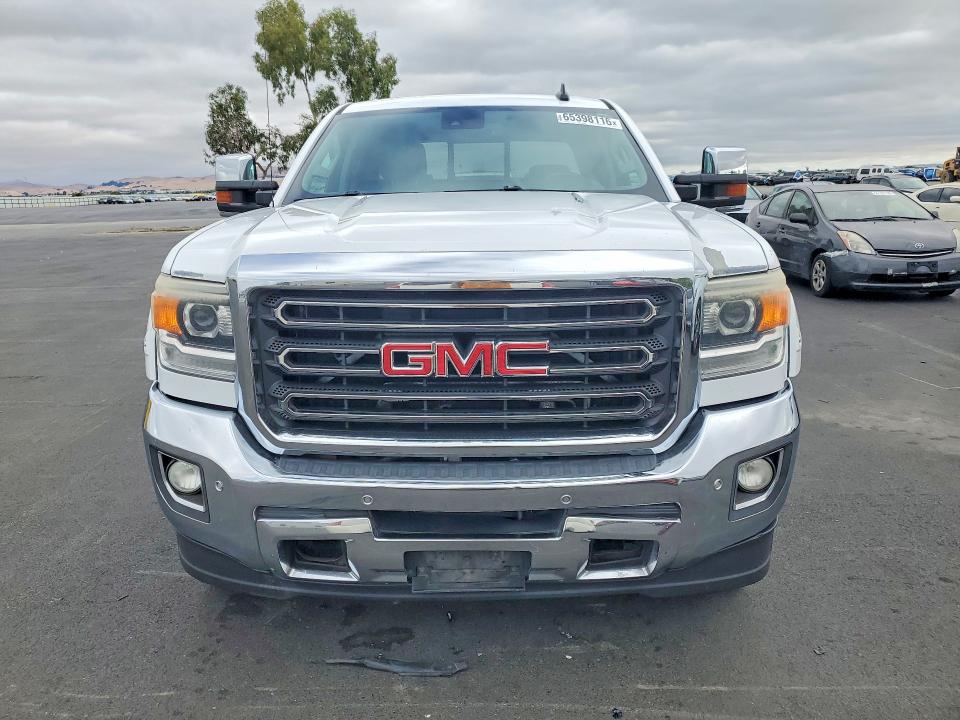 Photo 5 from auction – 2015 GMC SIERRA with VIN 1GT423E8XFF597854