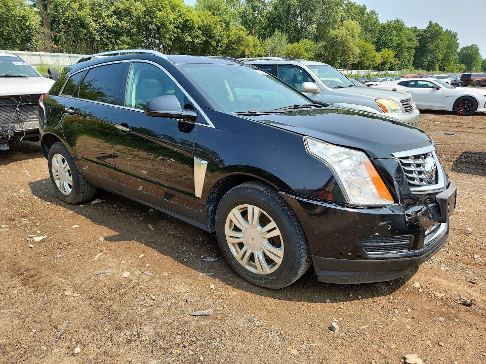 Photo 4 from auction – 2014 CADILLAC SRX with VIN 3GYFNEE39ES650001