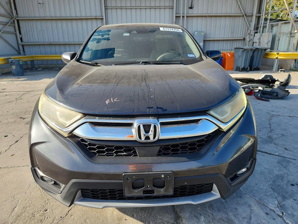 Photo 5 from auction – 2017 HONDA CR-V with VIN 7FARW1H58HE013415